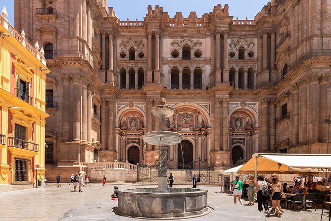 Málaga Romance: From Ancient Fortresses to Vibrant Markets - A Picturesque Plaza and Tapas Culture
