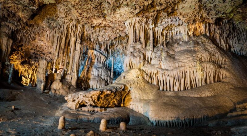 Mallorca: Drach and Hams Caves, and Porto Cristo Day Tour - Porto Cristo Village