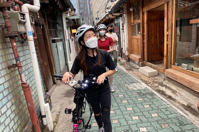 Market Food Tour & Evening E-bike Ride in Seoul - Cancellation and Booking Information