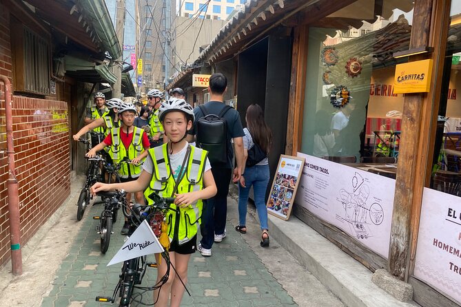Market Food Tour & Evening E-bike Ride in Seoul - Discovering Seoul by E-bike