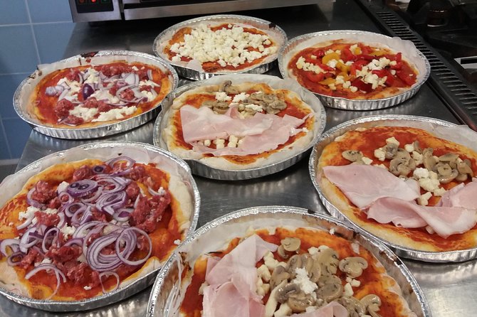 Market Tour & Traditional Tuscan Cooking Class in a Garden - Savoring the Tuscan Feast