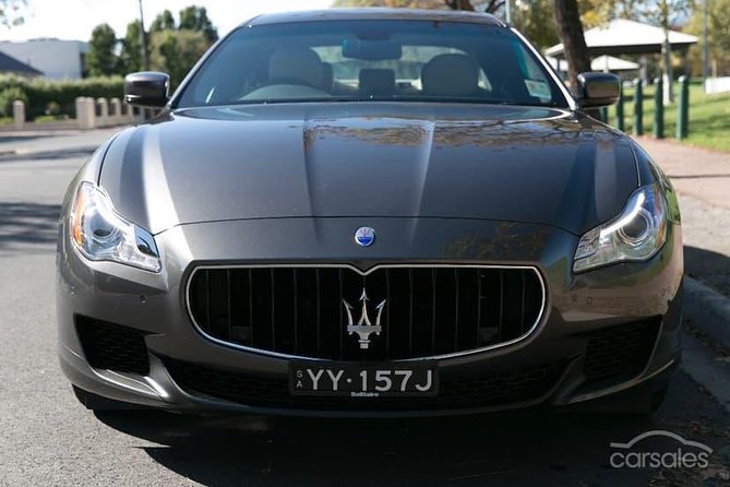 Maserati Quattroporte Limousine Transfer Cairns Airport to City - Included in the Transfer