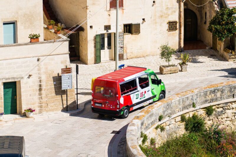 Matera: Open Top Bus Tour With Entrance to Casa Grotta - Audio Guide Experience
