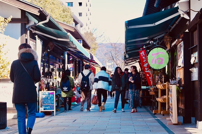 Matsumoto Castle, Sake & Food Walking Tour in Nagano - Browsing Matsumotos Shopping Street