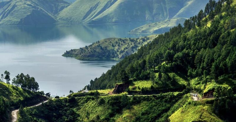 Medan: Car Rental With Airport Transfer & Local Tour - Exploring Serene Lake Toba