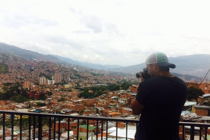 Medellin City Tour With Cable Car, Lunch, and Fernando Botero's - Admiring Botero Sculptures