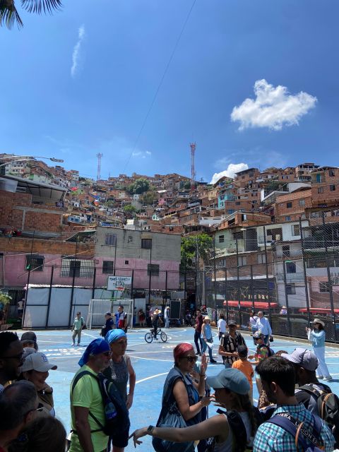 Medellín: Comuna 13 With Locals and Snacks - Local Snacks and Shopping