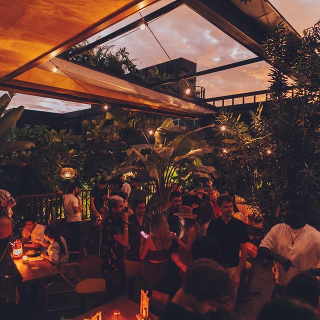 Medellin El Poblado Pub Crawl: Rooftop Vibes and Club Hoppin - Provenza District Exploration