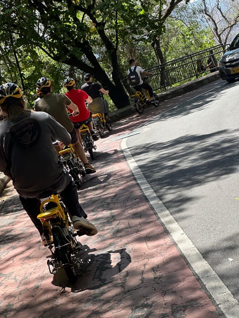 Medellín Full Day Electric Bike Tour + Lunch + Commune 13 - Language Options