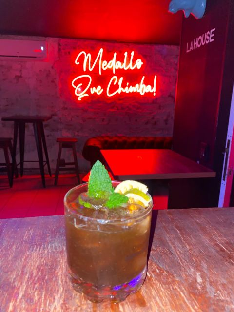 Medellin: Pub Crawl Nightlife With Aguardiente Tasting - Itinerary Highlights