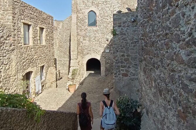 Medieval Village Walking Tour With Aperitif in Castelsardo - Meeting and Pickup