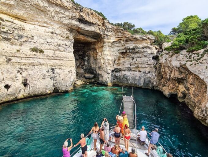 Menorca: Full-Day Boat Tour With Paella Lunch - Son Saura Swimming