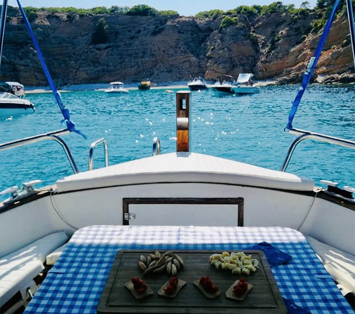 Menorca: Llaut Boat Cruise With Local Appetizers - Swim and Snorkel in Turquoise Waters