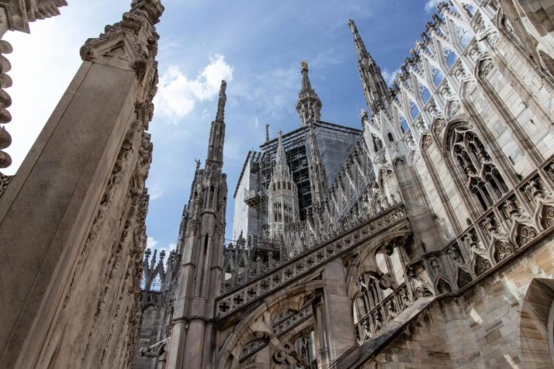 Milan: Guided City Tour With Duomo and Optional Terrace - Starting Location and Key Stops
