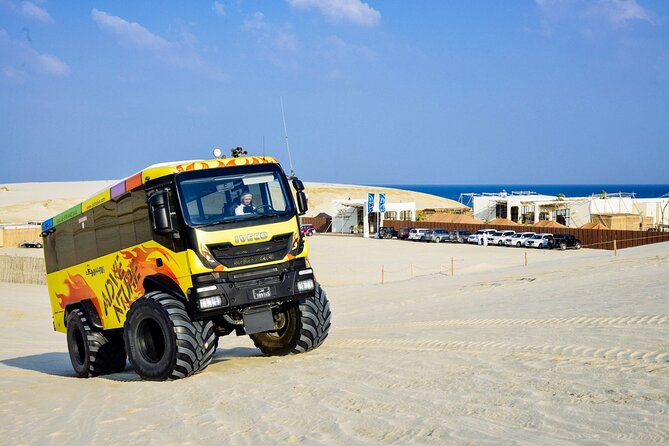 Monster Bus Desert Adventure: Dune Bashing and Sandboarding - Pickup and Arrival