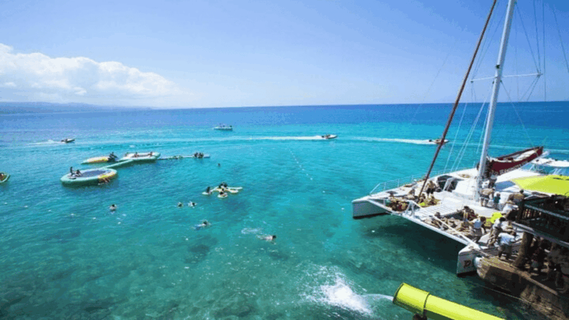 Montego Bay: Bamboo Rafting, Party Catamaran, and Snorkeling - Key Points
