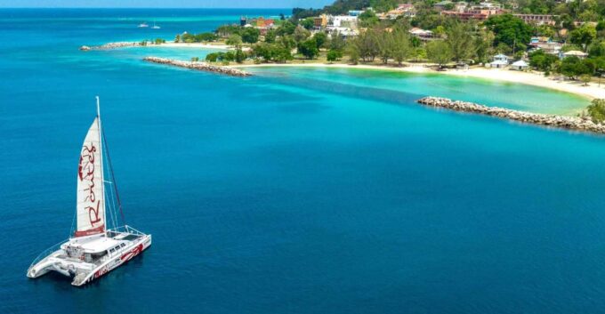 Montego Bay: Reggae Catamaran Cruise With Snorkeling - Cruise Along Montego Bay