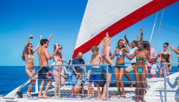 Montego Bay: Reggae Family Catamaran Cruise With Snorkeling - Cruise Along Jamaicas North Coast