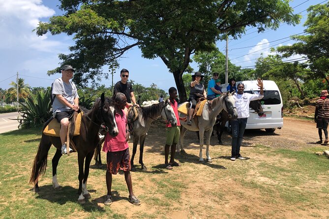 Montego Bay to Horse Back Riding, River Tubing, Blue Hole Falls - White River Calypso Rafting
