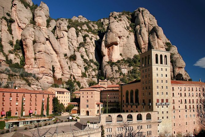 Montserrat Half Day With Cable Car and Easy Hike From Barcelona - Admiring the Basilicas Architecture