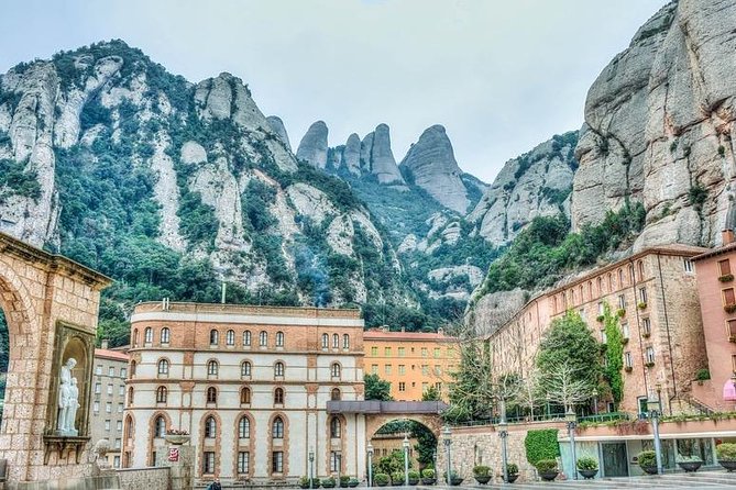 Montserrat Wine Tasting & Sitges -Reduced Group Hotel Pick up From Barcelona - Explore Montserrat and Sitges