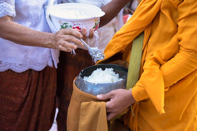Morning Buddhist Almsgiving, Grand Palace and Flower Market Tour in Bangkok - Almsgiving Ceremony