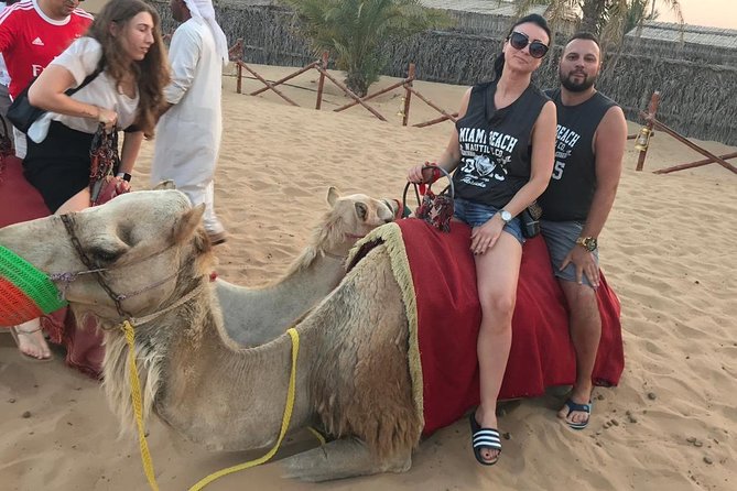 Morning Camel Trekking Over the Red Sand Dunes - Pricing and Booking Information