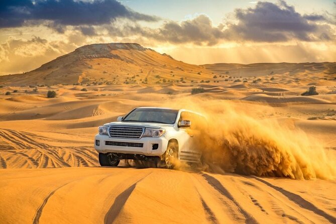 Morning Desert Safari Dubai With Dune Bashing and Sand Boarding - Sandboarding Down the Dunes