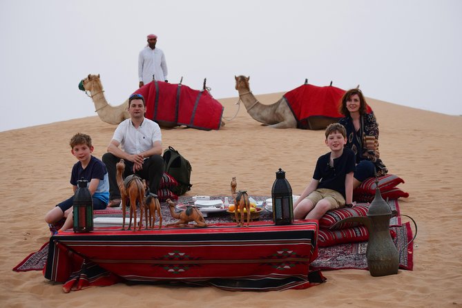 Morning Dubai Desert Safari With Camel Ride & Sand Boarding - Observing a Falconer Demonstration
