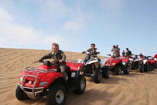 Morning Dubai Red Dune Safari, Quad Bike (ATV), Sand Boarding and Camel Ride - Pickup and Timing