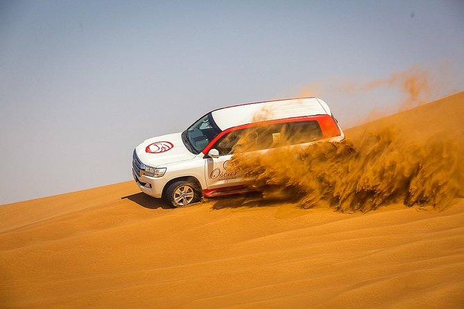 Morning Red Dunes With Camel Ride, Sandboarding and Refreshments - Just The Basics