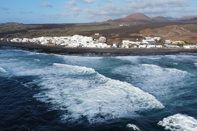 Morning Tai Chi Stretching on the Lava Beach and Organic Breakfast in Lanzarote - Booking and Pricing