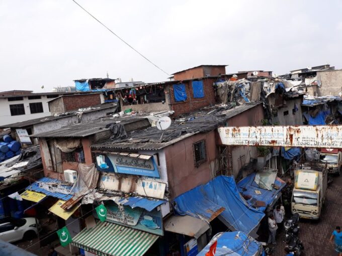 Mumbai: Dharavi Slum and Dhobi Ghat Tour With Train Ride - Riding the Local Train