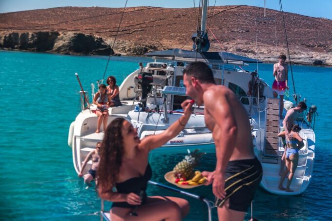 Mykonos: Catamaran Cruise With Lunch, Drinks and Transfer - Duration and Language