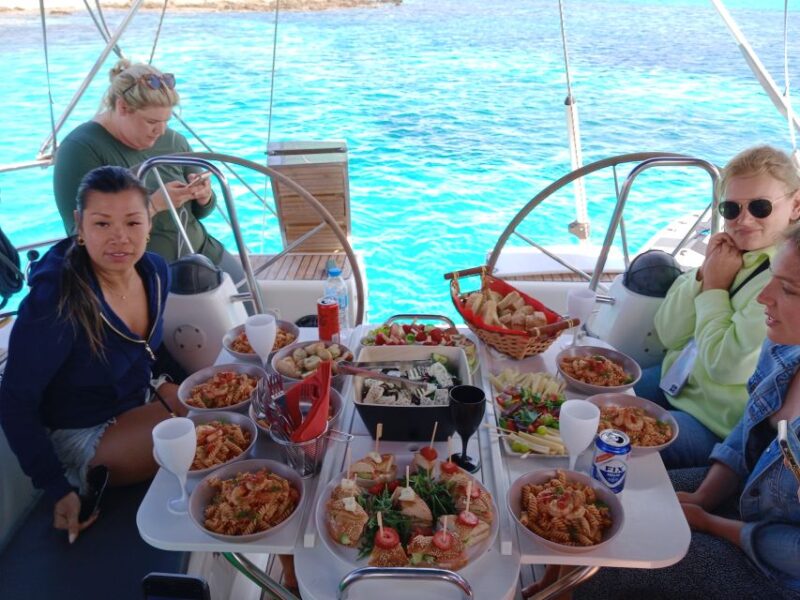 Mykonos: Delos and Rhenia Cruise With Swim and Greek Meal - Sailing to Rhenia Island