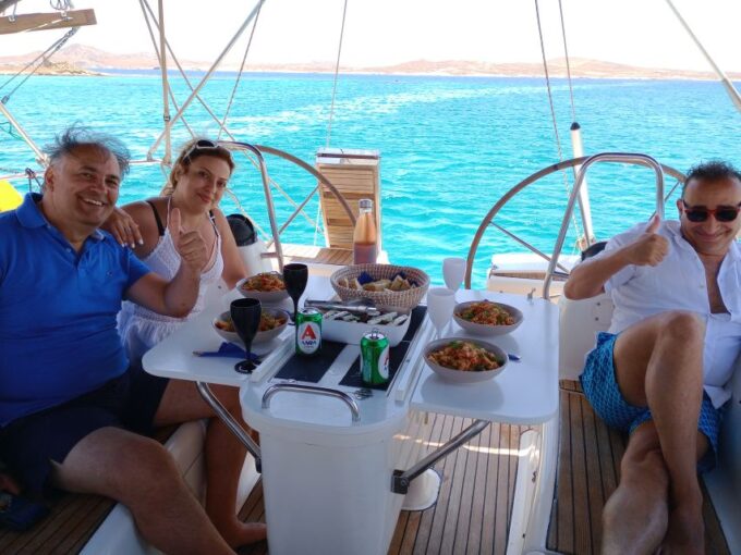 Mykonos: Delos and Rhenia Cruise With Swim and Greek Meal - Wine, Beer, and Soft Drinks