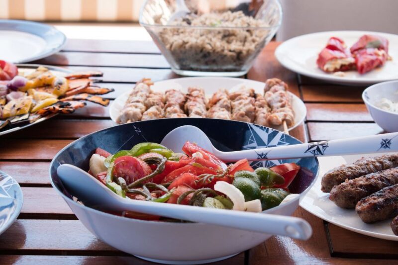 Mykonos: Delos and Rhenia Islands Cruise With BBQ Meal - Onboard BBQ and Drinks