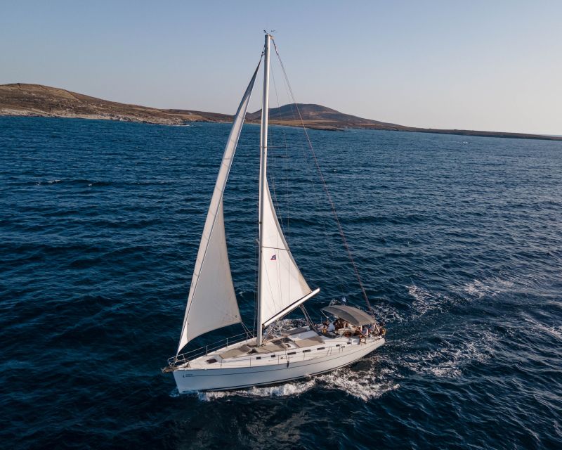 Mykonos: Delos & Rhenia Boat Cruise With Lunch & Transfer - Key Points