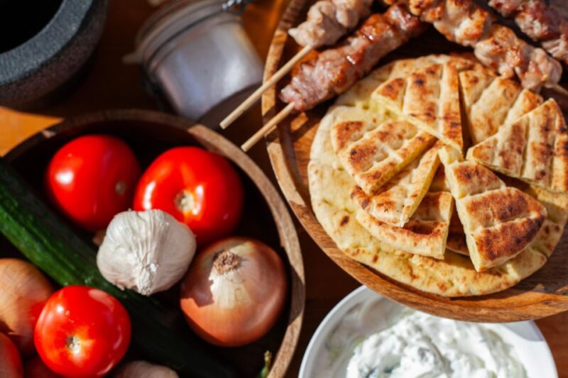 Mykonos: Make Souvlaki With Locals - Enjoying Greek White Wine