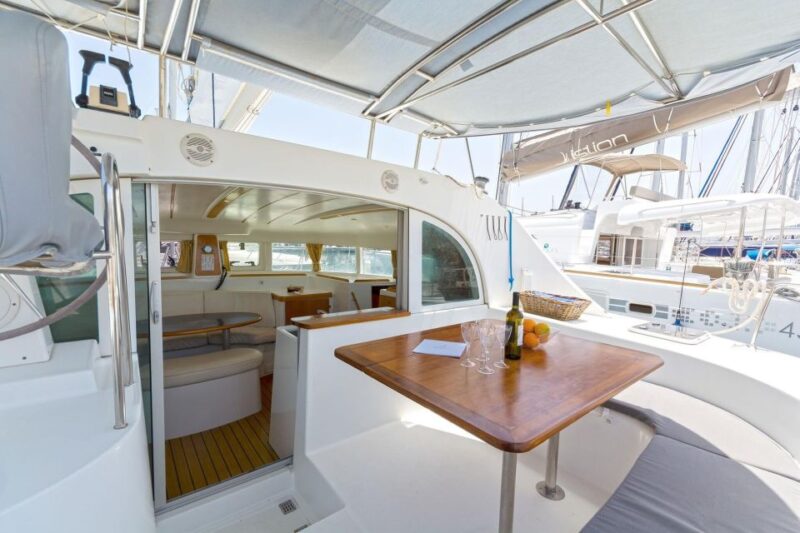 Mykonos: Private Catamaran Cruise W/ Food, Drinks & Transfer - Exploring Rhenia Island