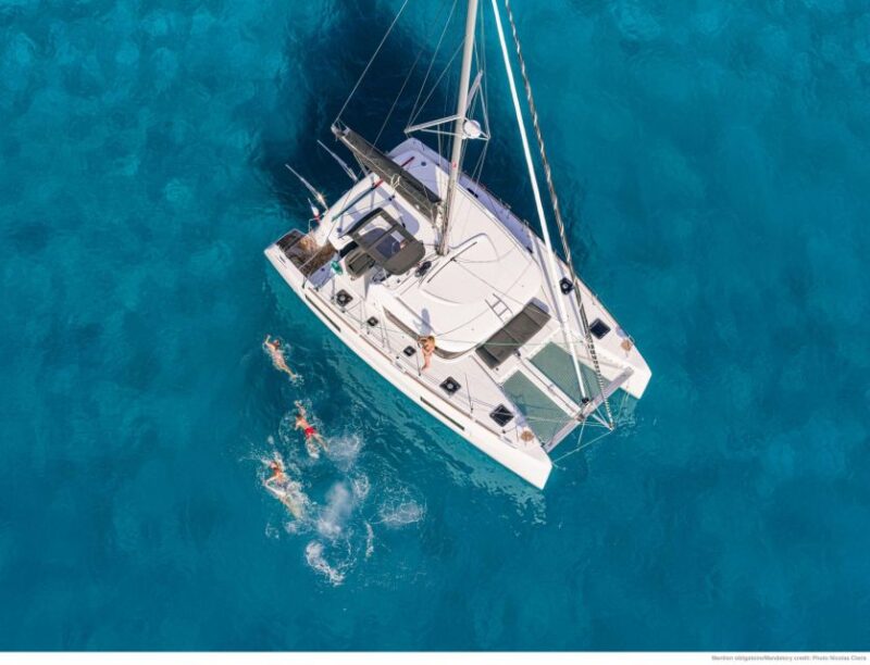 Mykonos: Rhenia Island Catamaran Cruise With Meal and Drinks - Relaxation on Spacious Decks