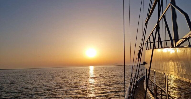 Mykonos: Sunset Boat Cruise With Light Dinner & Drinks - Dining on Board