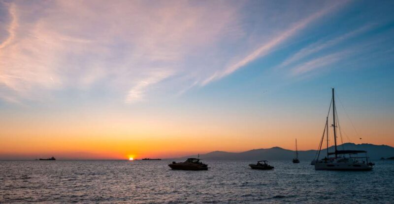 Mykonos: Sunset Cruise With a Buffet of Greek Delicacies - Highlights of the Cruise