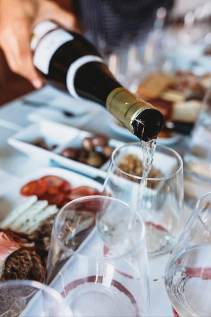 Mykonos Town: Wine Tour in Greek Gastronony With a Local - Authentic Greek Delicacies