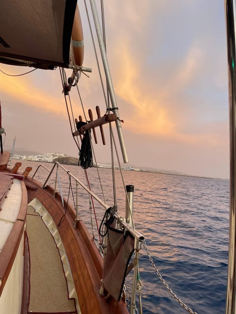 Naxos: Sunset Cruise With Wine and Snacks - Key Points