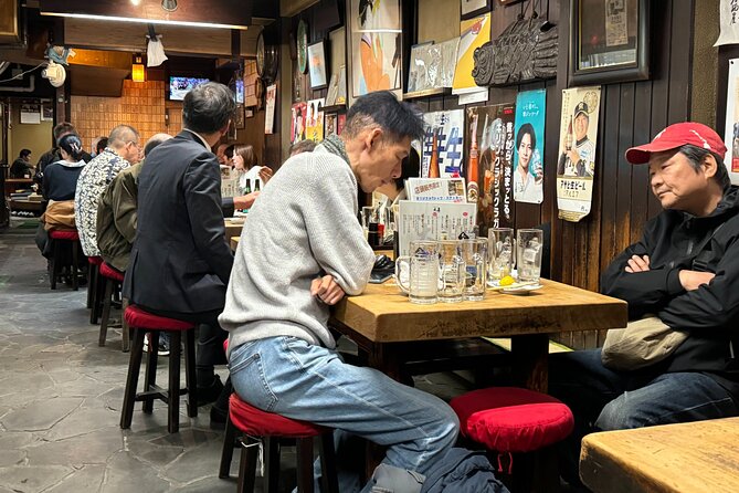 Near Kansai Airport: Izumisano Night Food Tour With Guide - Cancellation and Reservation Policy