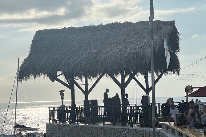 Negril 7 Mile Beach, Party Catamaran Cruise and Ricks Cafe Combo - Iconic Ricks Cafe Experience