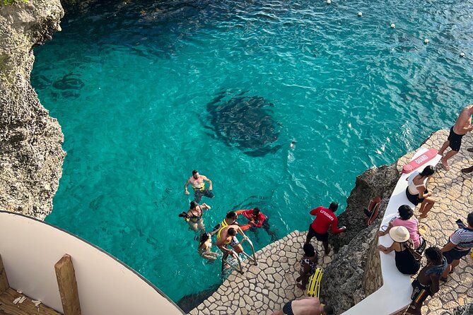 Negril 7 Mile Beach, Party Catamaran Cruise and Ricks Cafe Combo - Delectable Lunch Included