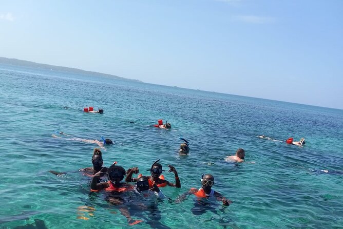 Negril Glass Bottom Boat Tour Snorkeling and Booby Cay - Booby Cay Island Exploration