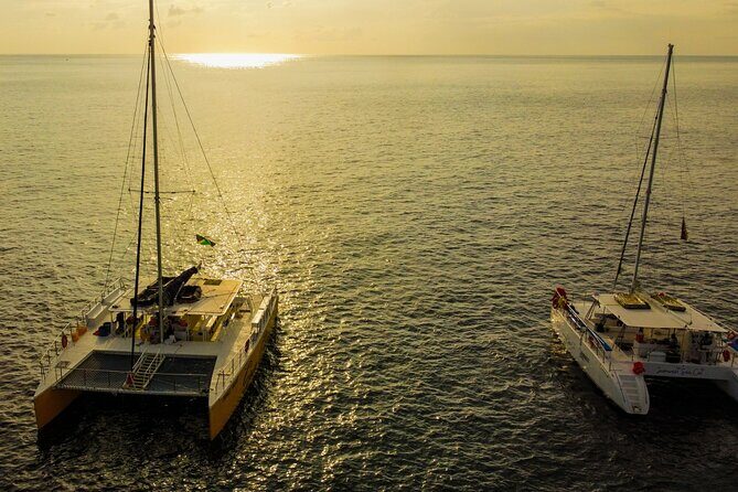 Negril Private Catamaran Cruise with Snorkeling and Drinks - Setting Sail along the Coastline